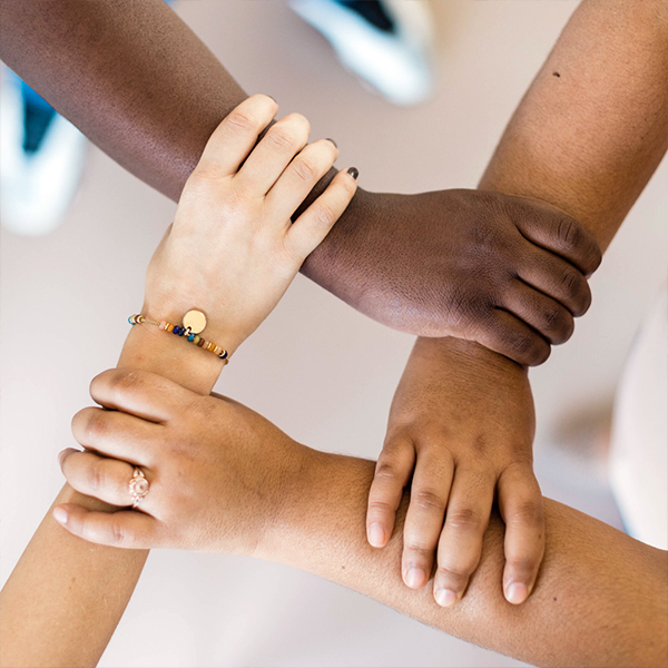 hands held showing racial diversity