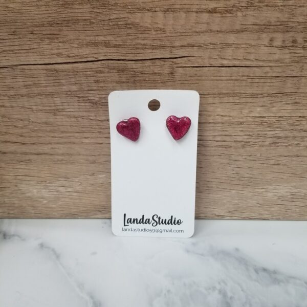 Handcrafted polymer clay heart stud earrings.