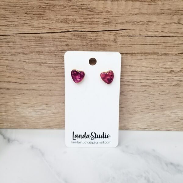 Handcrafted polymer clay heart stud earrings.