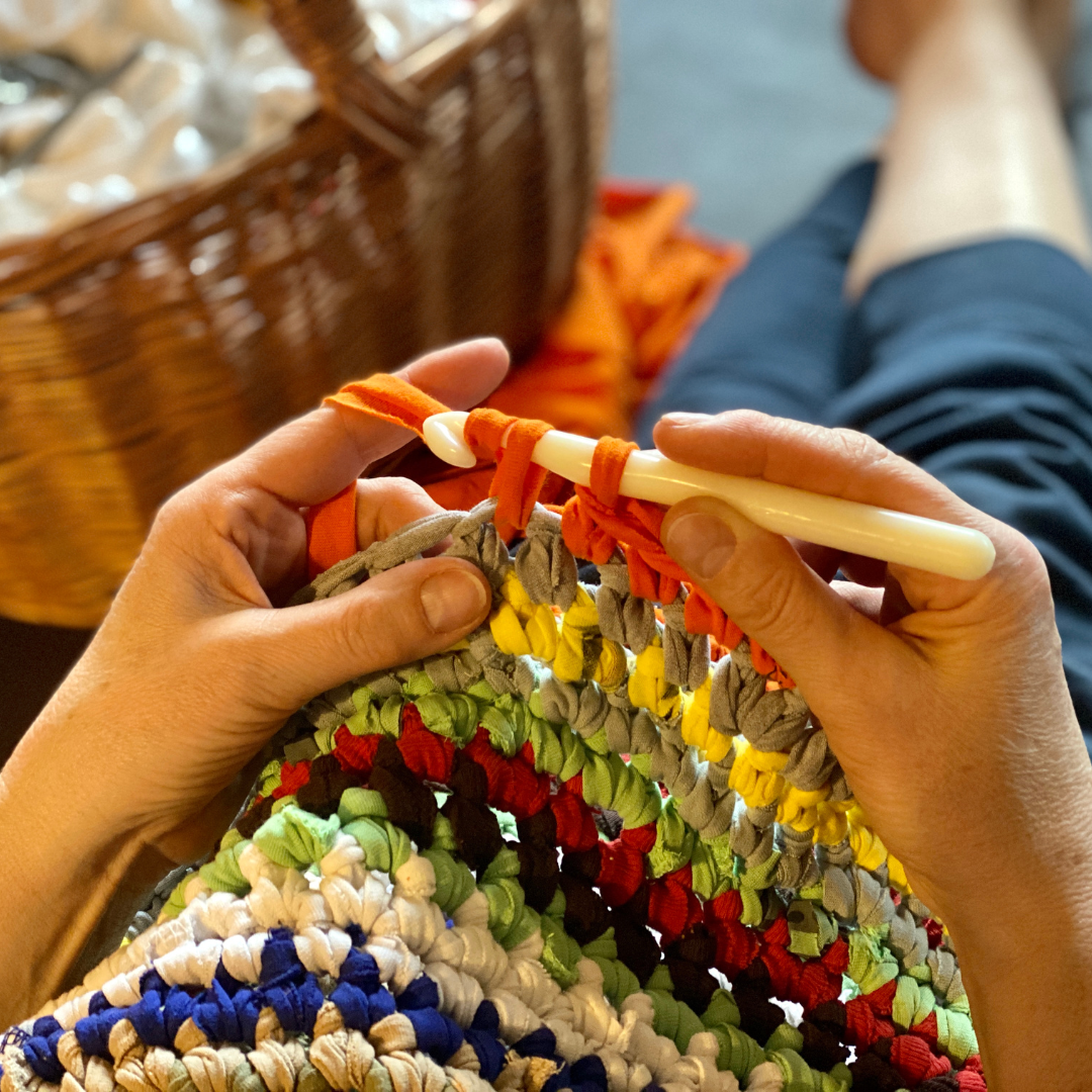 person crocheting | The Eclectic Chic Boutique