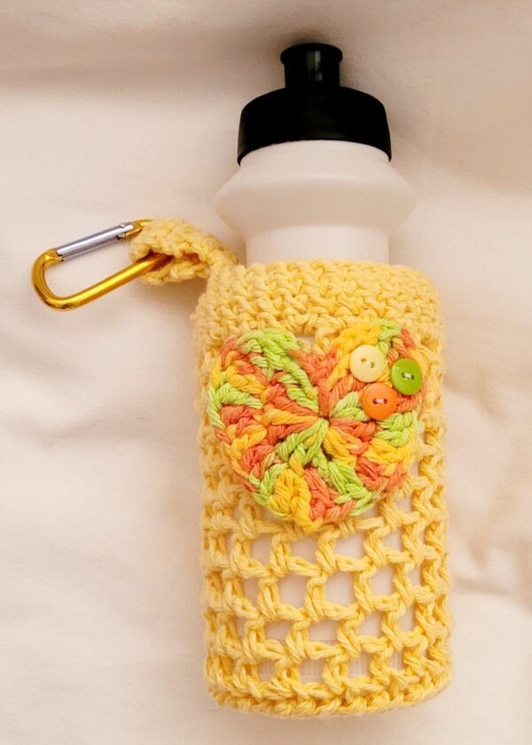 sunflower yellow crochet water bottle holder with caribiner clip and crochet heart applique, Yolanda's Creations
