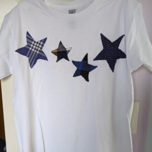 White t-shirt with four blue stars