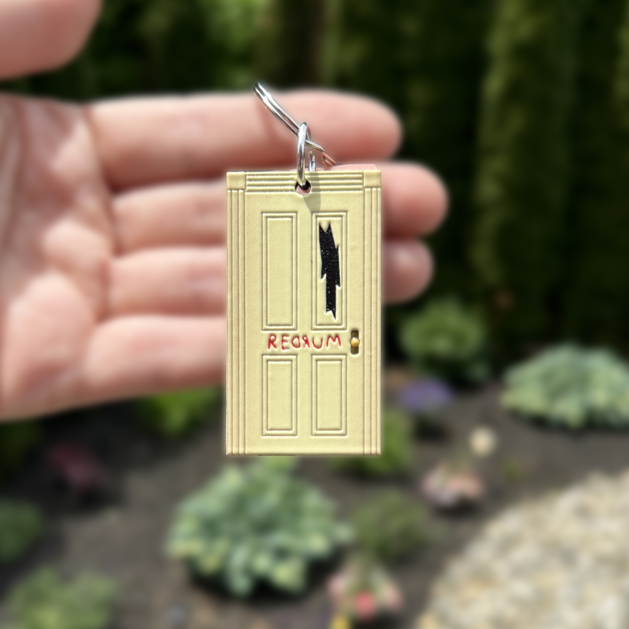 The Shining Door Textured Wooden Keychain